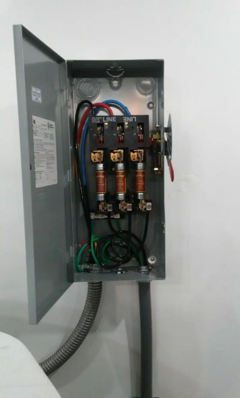 Three-phase disconnect switch installed for Smoke Detector Installation in Orchard Homes